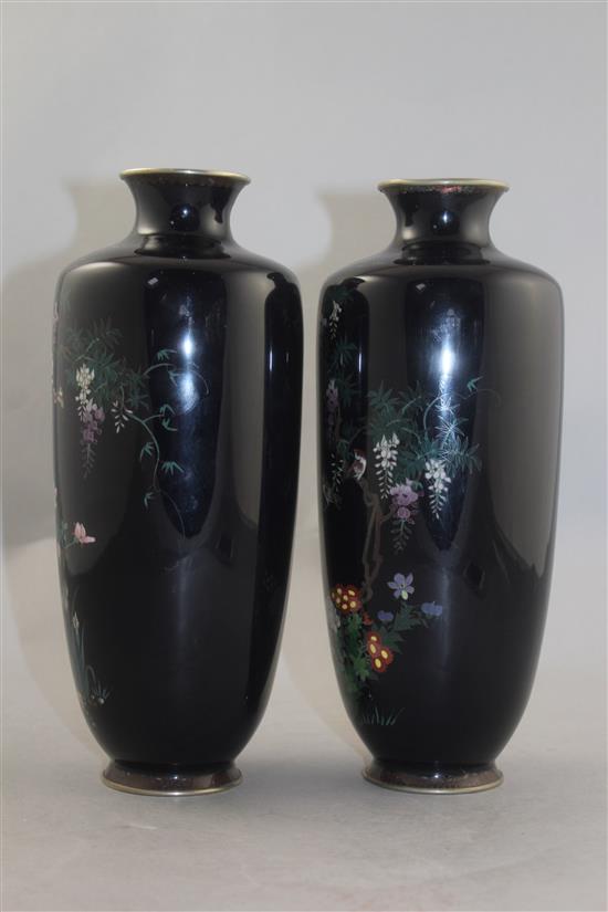 A pair of Japanese silver wire cloisonne enamel vases, Meiji period, 24.5cm, slight damage to enamel